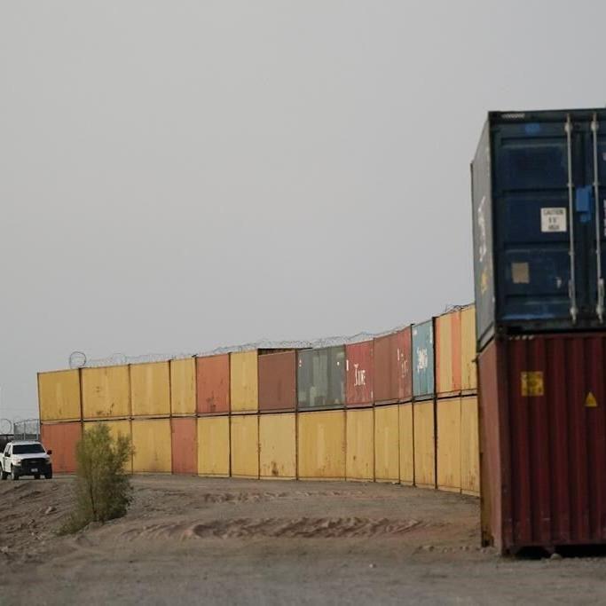Arizona sues US over containers along border with Mexico